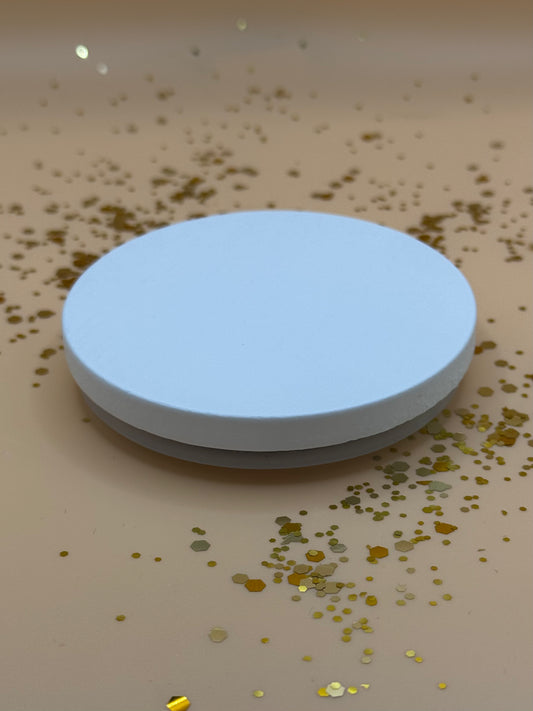 White wooden candle lid