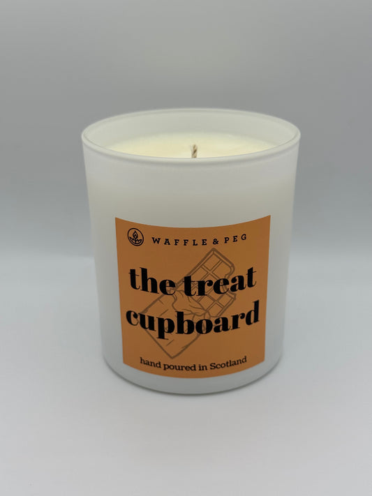 the treat cupboard candle
